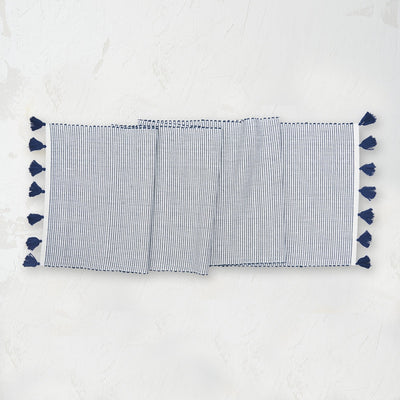 indigo and white striped handwoven placemat with tassels