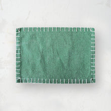 carter placemat with blanket stitch edge in teal