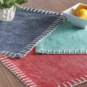 carter placemats in indigo tomato and lagoon