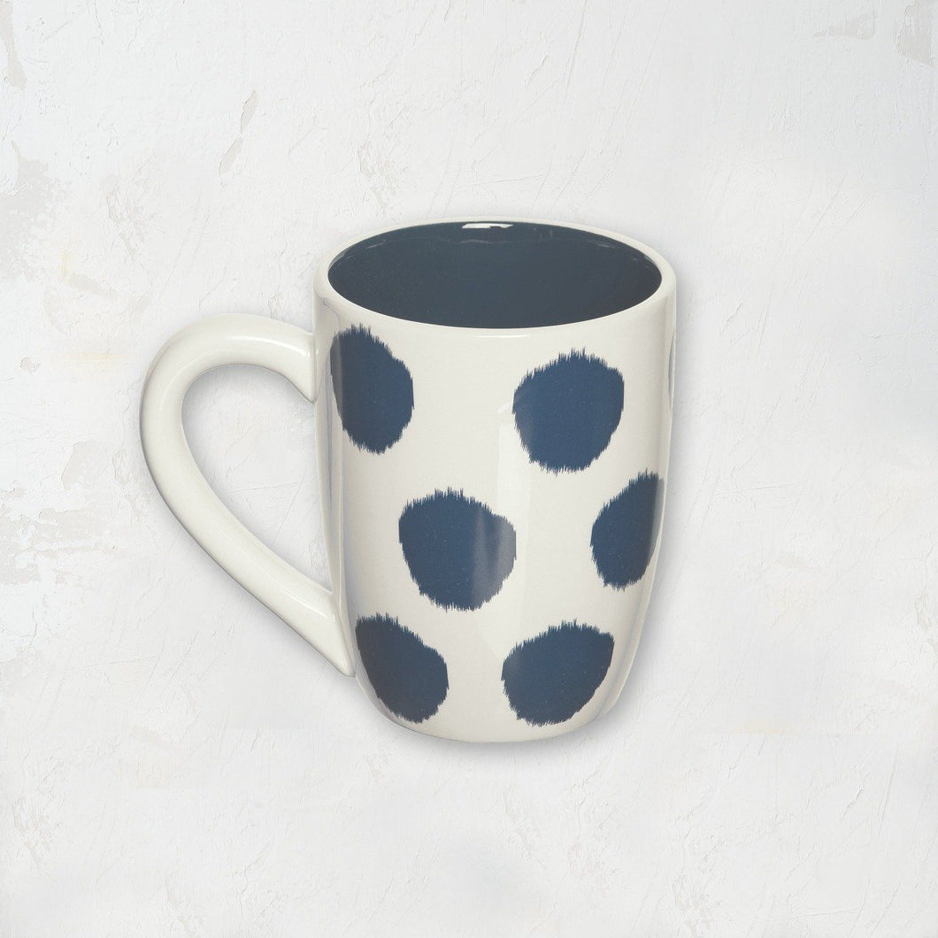 indigo and white polka dot mug