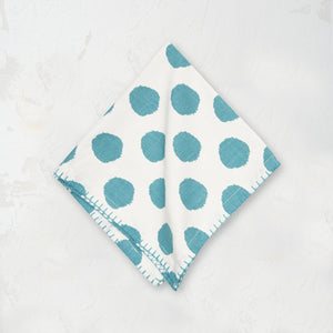blue lagoon and white polka dot cloth napkin with blanket stitched edge