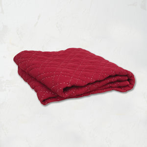 Elliot Ruby Personal Comforter with quilted, hand-stitched pattern in festive red.