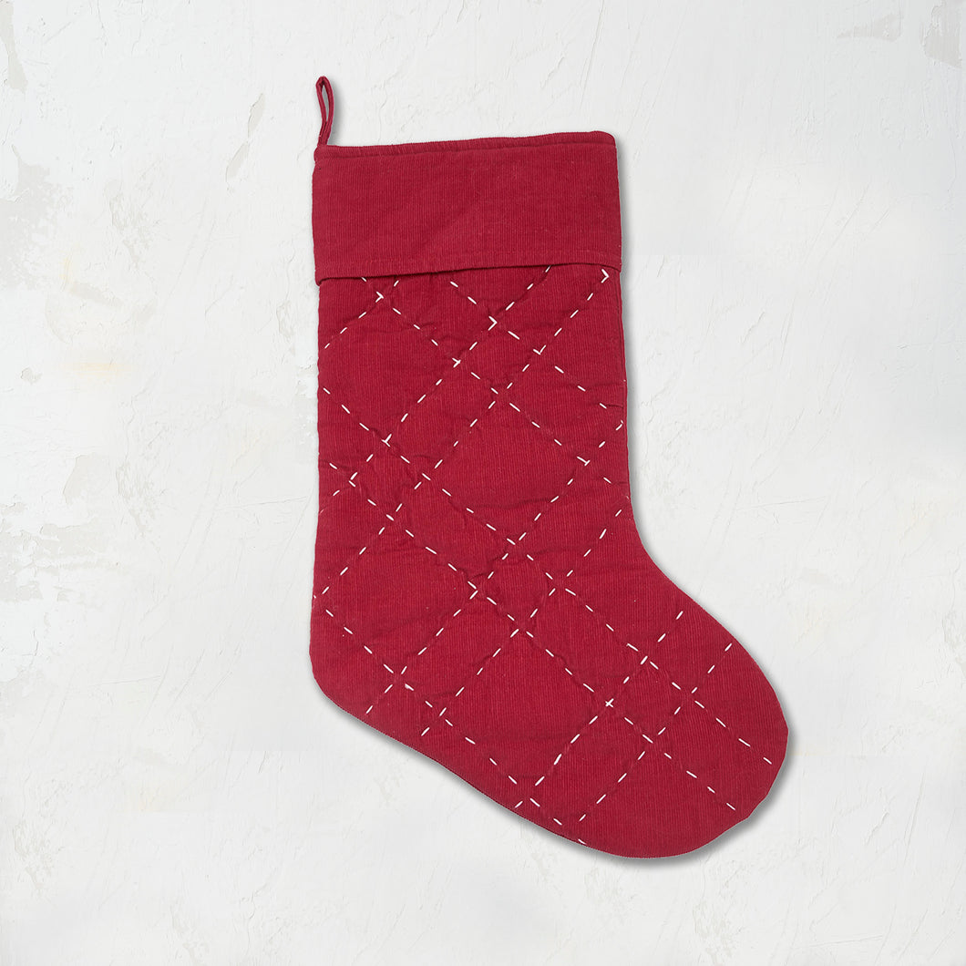 Elliot Ruby Quilted stocking in festive red.