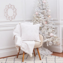 White Snowflake Pillow and White Snowflake Throw featuring a pom pom corner tassels and a tufted snowflake pattern on high-quality cotton.