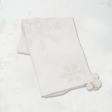 White Snowflake Throw featuring a pom pom corner tassels and a tufted snowflake pattern on high-quality cotton.