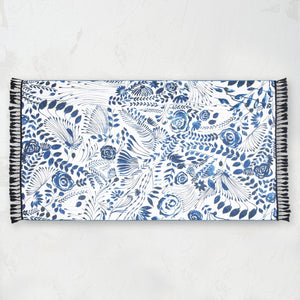 blue and white floral beach towel with fringe