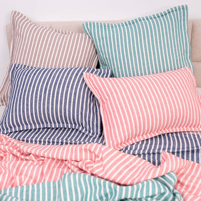 bengal stripe pillows and blankets in teal pink and tan