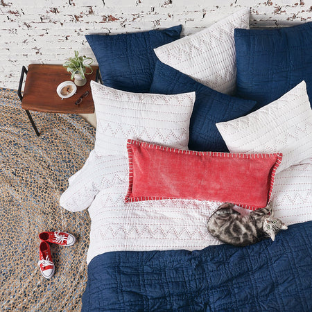 breck bedding set styled with indigo accents