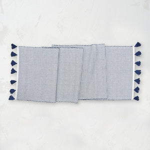 indigo and white striped handwoven placemat with tassels