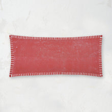 carter distressed decorative pillow with a blanket stitch edge in red