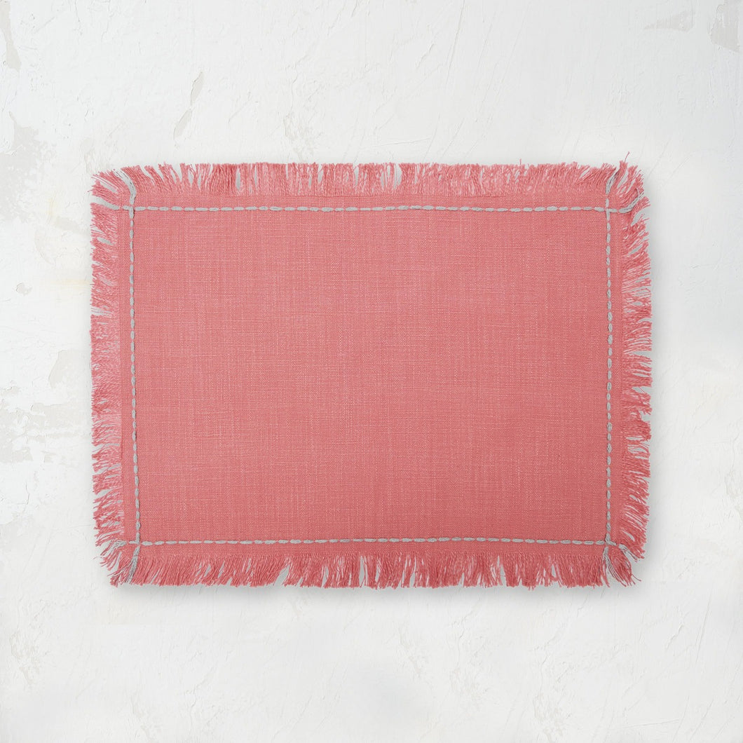 cheryl hibiscus pink placemat with handstitched border and fringed edge