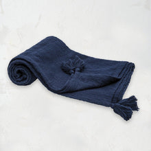 indigo dark blue devin throw blanket with tassel detail on the corners