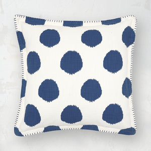 indigo and white polka dot decorative pillow with hand-stitched edge