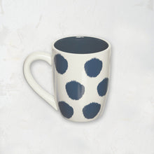 indigo and white polka dot mug