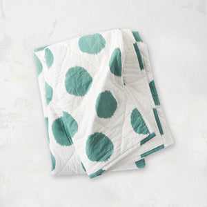 white and teal polka dot pet quilt