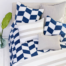 herringbone patch indigo quilt set styled with beige accents