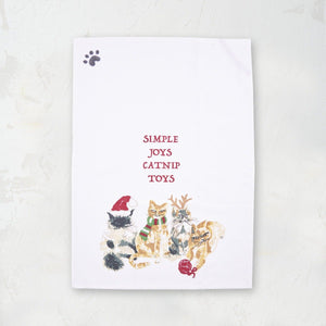 white dishtowel with cats dressed in holiday garb that reads simple joys catnip toys
