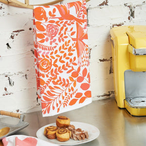 orange hummingbird and floral patterned kitchen towel