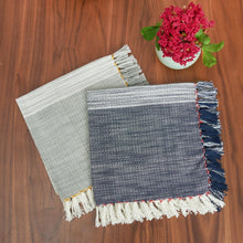 indigo and boulder cloth napkins with bright pop of color in edge stitching and tassel fringe
