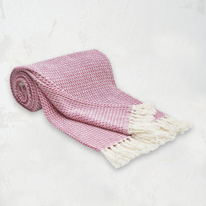 pink and white langford throw blanket with tassel fringe