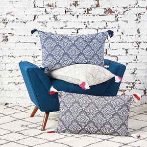 lottie decorative throw pillows on an armchair