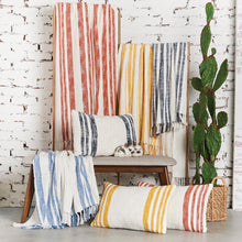 morgan decorative slub pillows with stripes and a slightly sun-kissed look styled with matching throw blankets