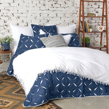 parker indigo quilt set styled with white accents