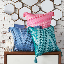 geometric zig zag pepi decorative pillows on a bench