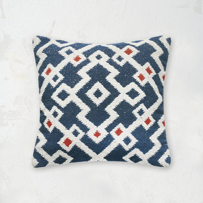 reggie geometric decorative throw pillow in indigo white and red