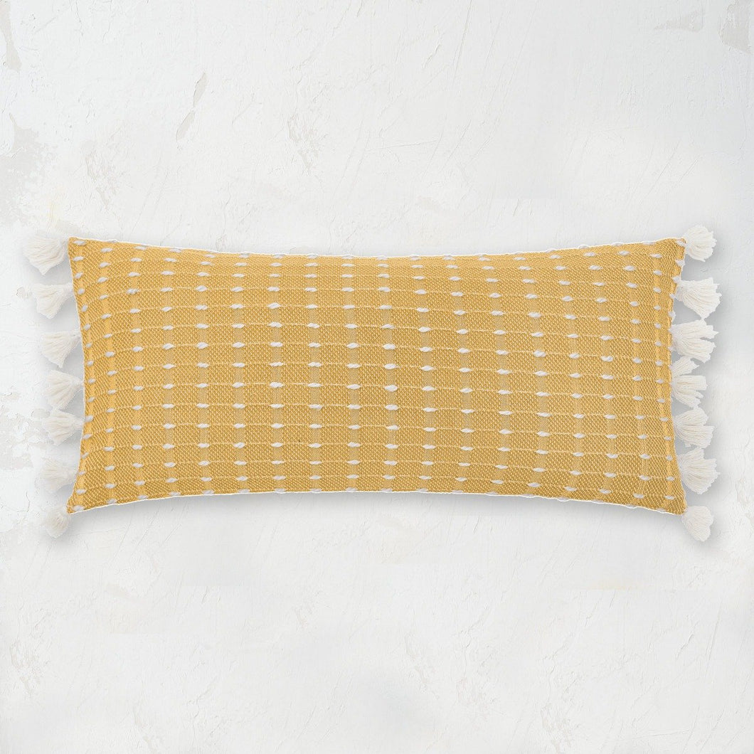 yellow riley decorative pillow featuring a raised stitch texture and tasseled fringe