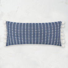 indigo riley decorative pillow featuring a raised stitch texture and tasseled fringe