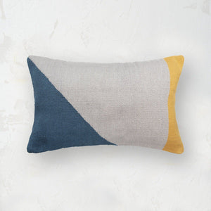 rory geometric throw pillow in blue gray and yellow