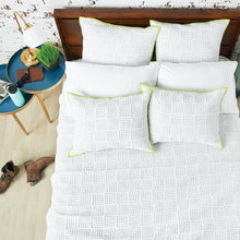 spencer quilt featuring delicate linework and a lime green edge